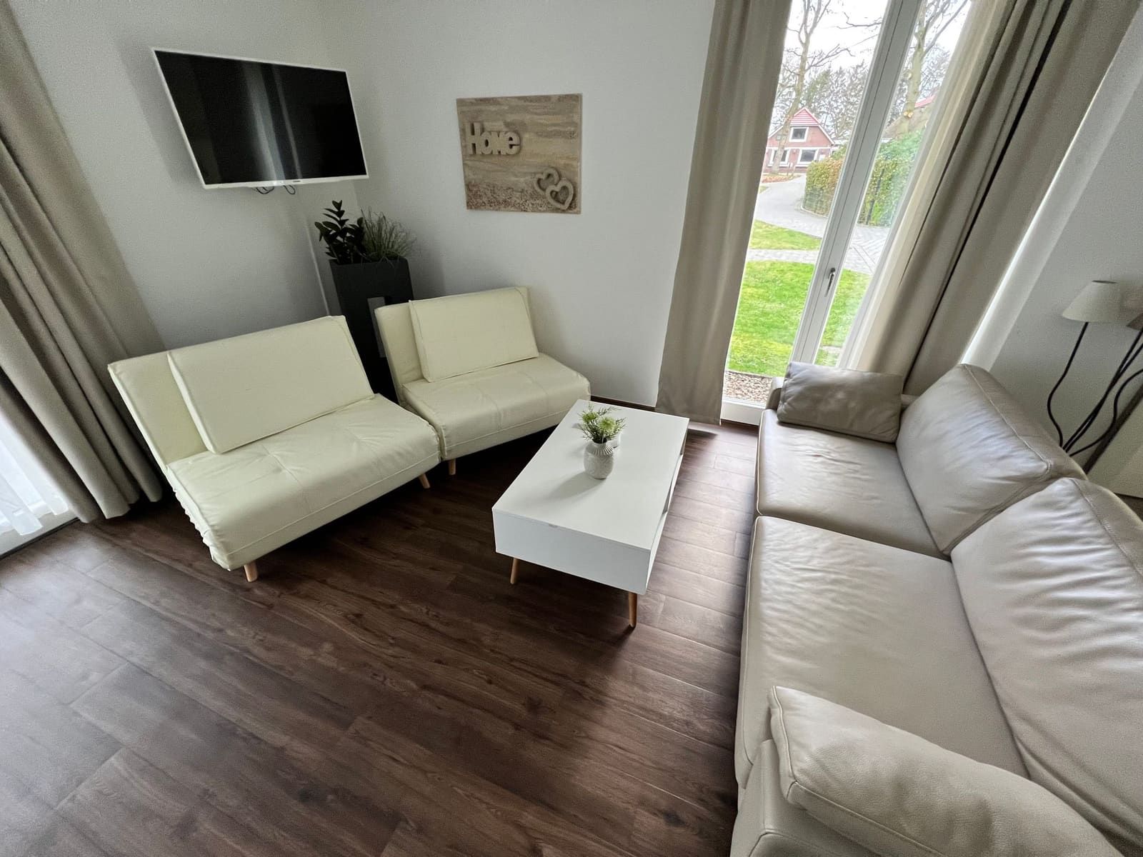Sonnenglut – Wohnzimmer, Ferienwohnung in Bad Zwischenahn